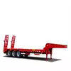 Semi-remorque basse hauteur pour le transport en toute sécurité de machines et de véhicules de construction surdimensionnés